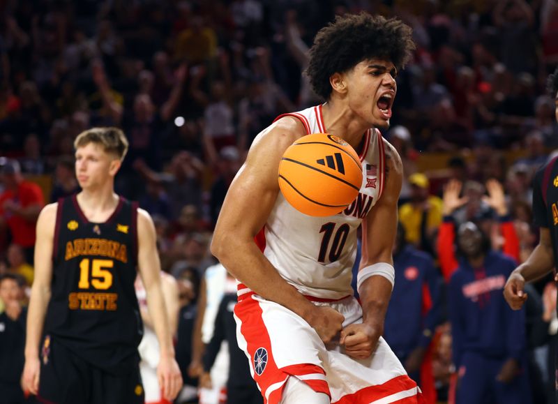 Jan 31, 2026; Tempe, Arizona, USA; Arizona Wildcats forward Koa Peat (10) celebrates against the Arizona State Sun Devils in the second half at Desert Financial Arena. Mandatory Credit: Mark J. Rebilas-Imagn Images