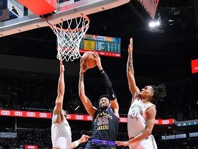 SAN ANTONIO, TX - DECEMBER 15: Christian Wood #35 of the Los Angeles Lakers drives to the basket during the game against the San Antonio Spurs on December 15, 2023 at the Frost Bank Center in San Antonio, Texas. NOTE TO USER: User expressly acknowledges and agrees that, by downloading and or using this photograph, user is consenting to the terms and conditions of the Getty Images License Agreement. Mandatory Copyright Notice: Copyright 2023 NBAE (Photos by Michael Gonzales/NBAE via Getty Images)