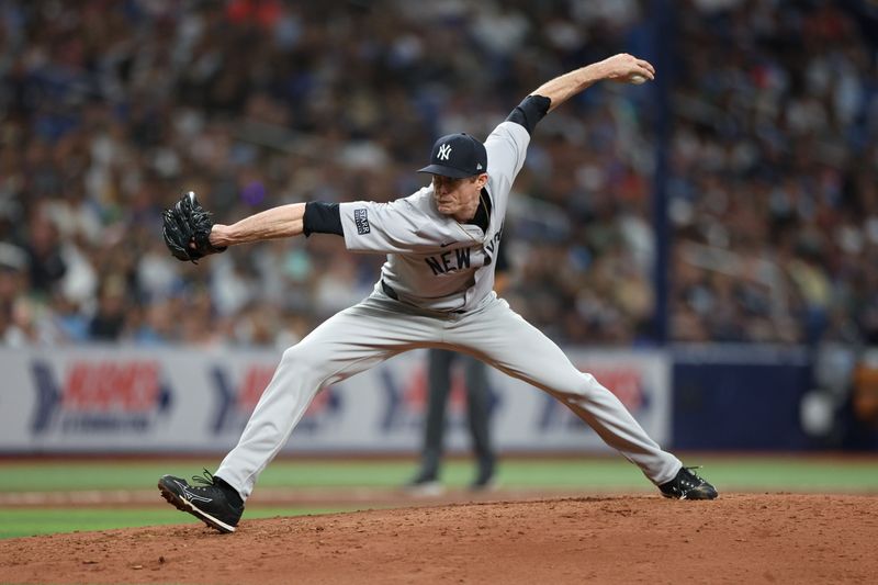 Jul 10, 2024; St. Petersburg, Florida, USA; New York Yankees pitcher Tim Hill (54) throws a pitch against the Tampa Bay Rays in the fifth inning at Tropicana Field. Mandatory Credit: Nathan Ray Seebeck-USA TODAY Sports