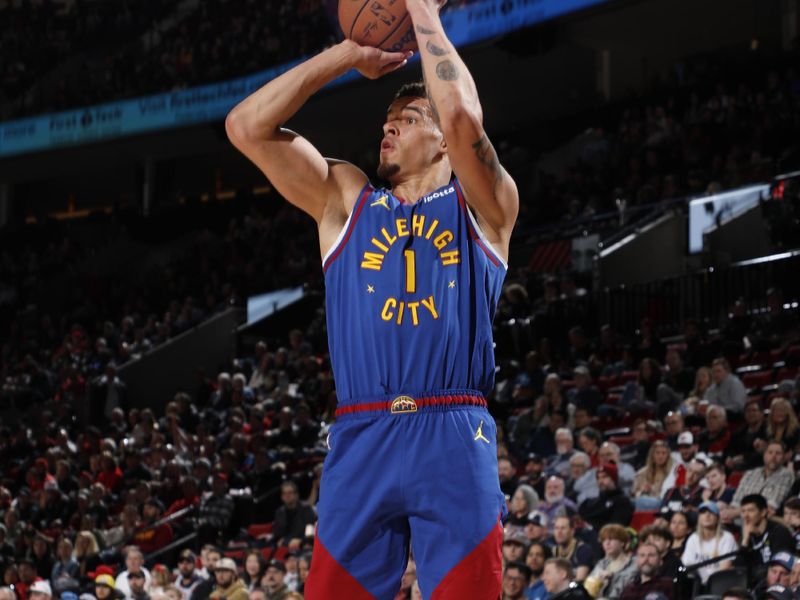 PORTLAND, OR - FEBRUARY 23: Michael Porter Jr. #1 of the Denver Nuggets shoots the ball during the game against the Portland Trail Blazers on February 23, 2024 at the Moda Center Arena in Portland, Oregon. NOTE TO USER: User expressly acknowledges and agrees that, by downloading and or using this photograph, user is consenting to the terms and conditions of the Getty Images License Agreement. Mandatory Copyright Notice: Copyright 2024 NBAE (Photo by Cameron Browne/NBAE via Getty Images)