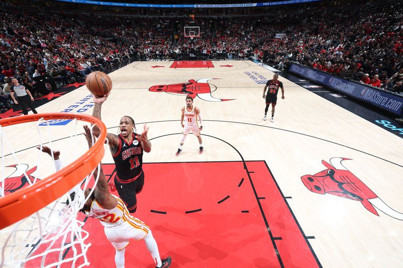 CHICAGO, IL - APRIL 17:  DeMar DeRozan #11 of the Chicago Bulls goes to the basket during the game against the Atlanta Hawks during the 2024 Play-In Tournament  on April 17, 2024 at United Center in Chicago, Illinois. NOTE TO USER: User expressly acknowledges and agrees that, by downloading and or using this photograph, User is consenting to the terms and conditions of the Getty Images License Agreement. Mandatory Copyright Notice: Copyright 2024 NBAE (Photo by Jeff Haynes/NBAE via Getty Images)