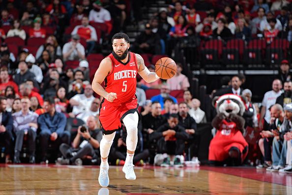 HOUSTON, TX - DECEMBER 20:   Fred VanVleet #5 of the Houston Rockets handles the ball during the game against the Atlanta Hawks on December 20, 2023 at the Toyota Center in Houston, Texas. NOTE TO USER: User expressly acknowledges and agrees that, by downloading and or using this photograph, User is consenting to the terms and conditions of the Getty Images License Agreement. Mandatory Copyright Notice: Copyright 2023 NBAE (Photo by Logan Riely/NBAE via Getty Images)