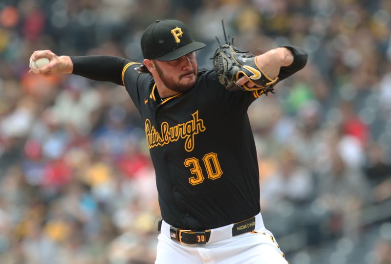 Jun 8, 2025; Pittsburgh, Pennsylvania, USA; Pittsburgh Pirates starting pitcher Paul Skenes (30) delivers a pitch against the Philadelphia Phillies during the first inning at PNC Park. Mandatory Credit: Charles LeClaire-Imagn Images