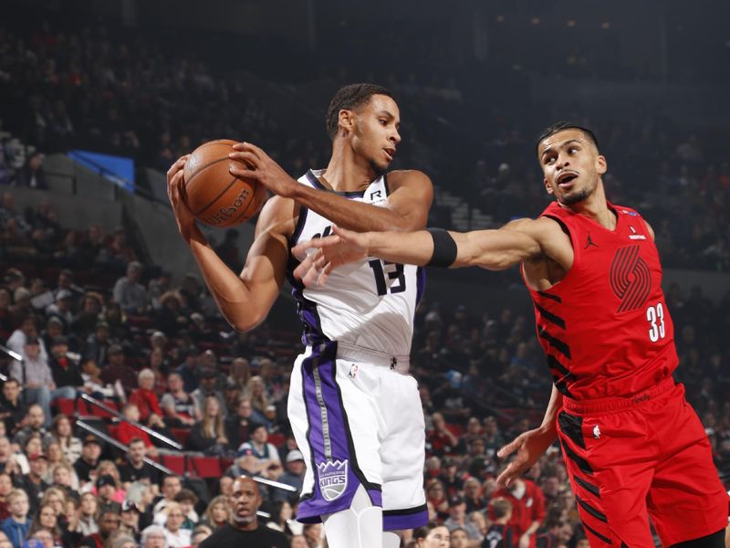 PORTLAND, OR - NOVEMBER 29: Keegan Murray #13 of the Sacramento Kings handles the ball during the game against the Portland Trail Blazers during the Emirates NBA Cup on November 29, 2024 at the Moda Center Arena in Portland, Oregon. NOTE TO USER: User expressly acknowledges and agrees that, by downloading and or using this photograph, user is consenting to the terms and conditions of the Getty Images License Agreement. Mandatory Copyright Notice: Copyright 2024 NBAE (Photo by Cameron Browne/NBAE via Getty Images)