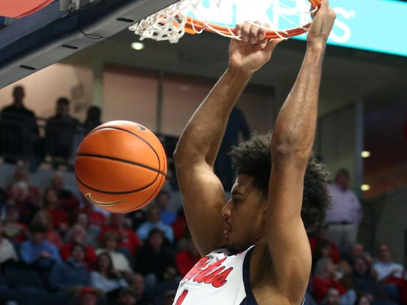 Jan 10, 2024; Oxford, Mississippi, USA; Mississippi Rebels forward Jaemyn Brakefield (4) dunks during the second half against the Florida Gators at The Sandy and John Black Pavilion at Ole Miss. Mandatory Credit: Petre Thomas-USA TODAY Sports