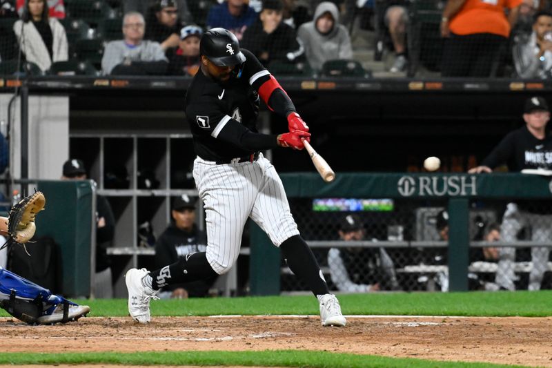 Sep 12, 2023; Chicago, Illinois, USA; Chicago White Sox designated hitter Eloy Jimenez (74) bats against the Kansas City Royals during the sixth inning at Guaranteed Rate Field. Mandatory Credit: Matt Marton-USA TODAY Sports