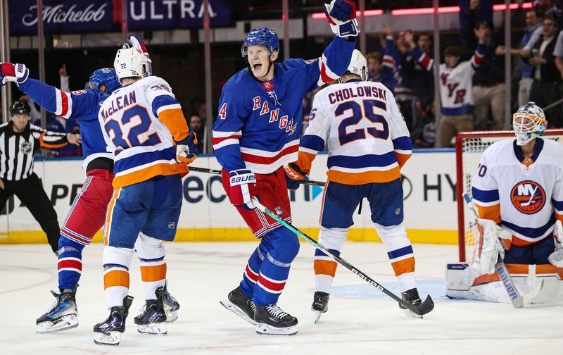 Sep 24, 2024; New York, New York, USA; New York Rangers center Adam Edstrom (84) celebrates his game-winning goal against the New York Islanders during the third period at Madison Square Garden. Mandatory Credit: Danny Wild-Imagn Images