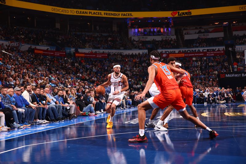 OKLAHOMA CITY, OK - NOVEMBER 15: Devin Booker #1 of the Phoenix Suns handles the ball during the game against the Oklahoma City Thunder during the Emirates NBA Cup game on November 15, 2024 at Paycom Center in Oklahoma City, Oklahoma. NOTE TO USER: User expressly acknowledges and agrees that, by downloading and or using this photograph, User is consenting to the terms and conditions of the Getty Images License Agreement. Mandatory Copyright Notice: Copyright 2024 NBAE (Photo by Zach Beeker/NBAE via Getty Images)