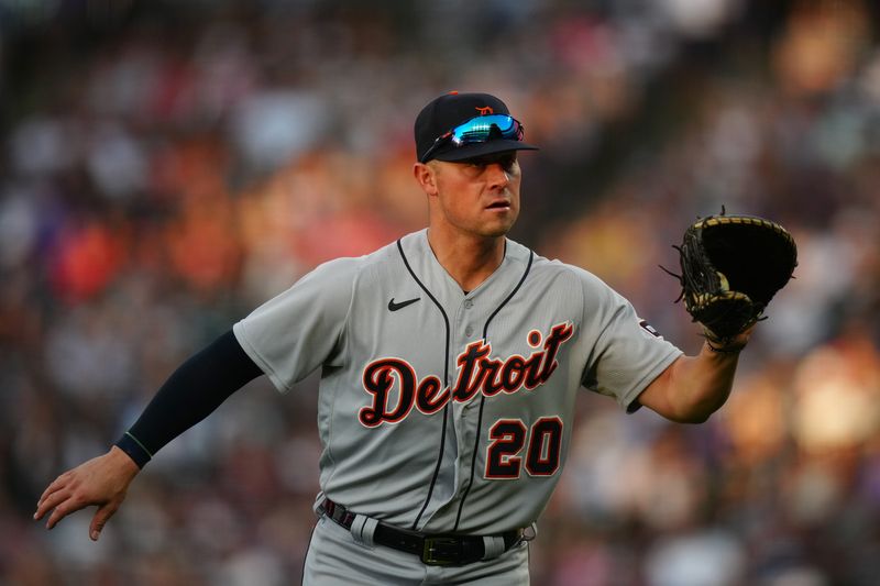 Jul 1, 2023; Denver, Colorado, USA; Detroit Tigers first baseman Spencer Torkelson (20) fields the ball in the fourth inning against the Colorado Rockies at Coors Field. Mandatory Credit: Ron Chenoy-USA TODAY Sports