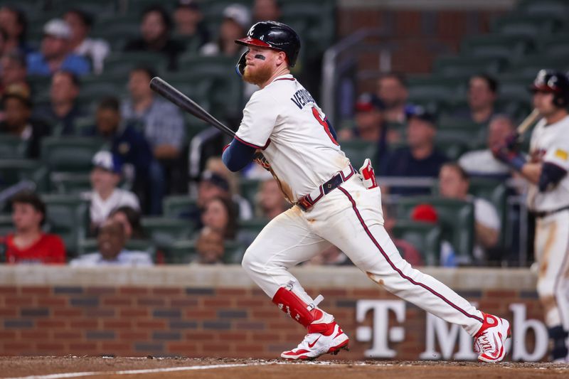 May 12, 2025; Atlanta, Georgia, USA; Atlanta Braves left fielder Alex Verdugo (8) hits a walk-off single against the Washington Nationals in the ninth inning at Truist Park. Mandatory Credit: Brett Davis-Imagn Images
