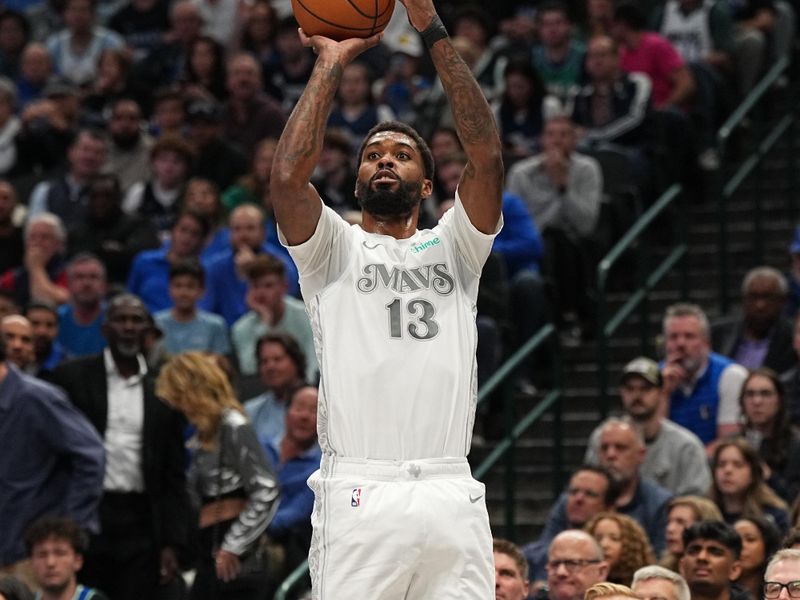 DALLAS, TX - NOVEMBER 27: Naji Marshall #13 of the Dallas Mavericks three point basket during the game against the New York Knicks on November 27, 2024 at the American Airlines Center in Dallas, Texas. NOTE TO USER: User expressly acknowledges and agrees that, by downloading and or using this photograph, User is consenting to the terms and conditions of the Getty Images License Agreement. Mandatory Copyright Notice: Copyright 2024 NBAE (Photo by Glenn James/NBAE via Getty Images)