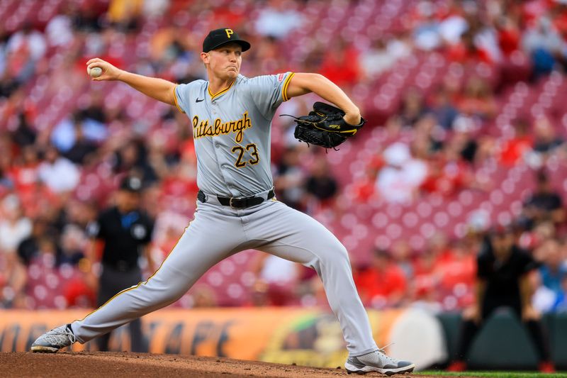 Sep 20, 2024; Cincinnati, Ohio, USA; Pittsburgh Pirates starting pitcher Mitch Keller (23) pitches against the Cincinnati Reds in the first inning at Great American Ball Park. Mandatory Credit: Katie Stratman-Imagn Images