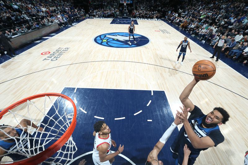 MINNEAPOLIS, MN -  MARCH 4: Karl-Anthony Towns #32 of the Minnesota Timberwolves drives to the basket during the game against the Portland Trail Blazers on March 4, 2024 at Target Center in Minneapolis, Minnesota. NOTE TO USER: User expressly acknowledges and agrees that, by downloading and or using this Photograph, user is consenting to the terms and conditions of the Getty Images License Agreement. Mandatory Copyright Notice: Copyright 2024 NBAE (Photo by David Sherman/NBAE via Getty Images)