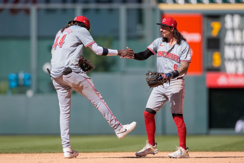 Jun 5, 2024; Denver, Colorado, USA; Cincinnati Reds shortstop Elly De La Cruz (44) and second base Jonathan India (6) celebrate after winning against the Colorado Rockies at Coors Field. Mandatory Credit: Andrew Wevers-USA TODAY Sports