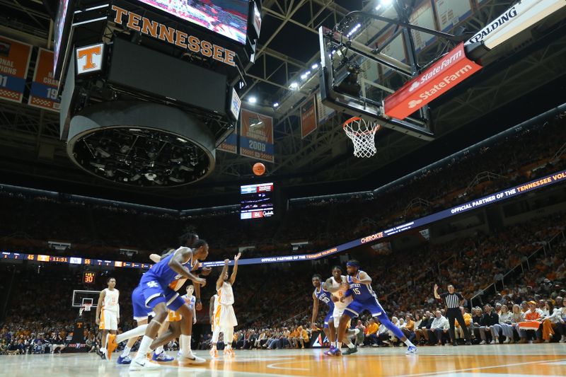 Jan 28, 2025; Knoxville, Tennessee, USA; Tennessee Volunteers guard Zakai Zeigler (5) shoots a free throw against the Kentucky Wildcats during the second half at Thompson-Boling Arena at Food City Center. Mandatory Credit: Randy Sartin-Imagn Images