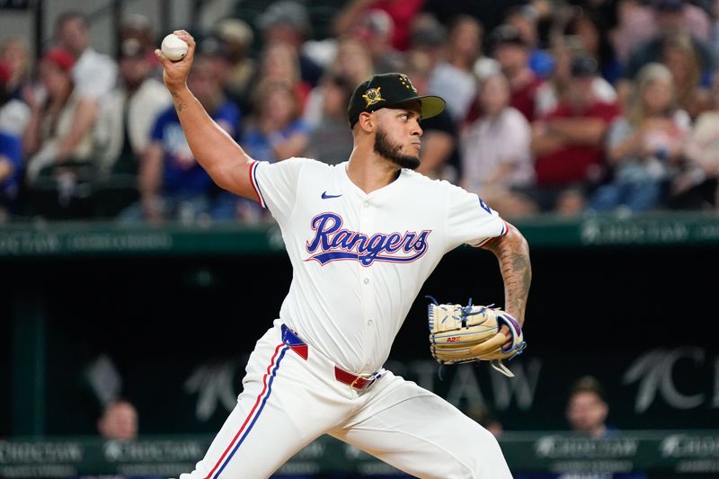 May 18, 2024; Arlington, Texas, USA; Texas Rangers relief pitcher Jonathan Hernandez (72) throws to the plate during the eighth inning against the Los Angeles Angels at Globe Life Field. Mandatory Credit: Raymond Carlin III-USA TODAY Sports