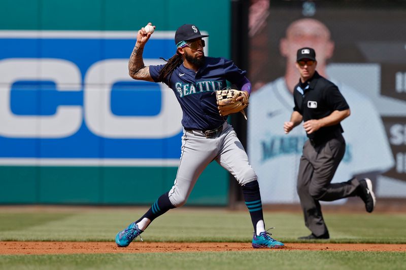 May 25, 2024; Washington, District of Columbia, USA; Seattle Mariners shortstop J.P. Crawford (3) makes a throw to first base on a ground ball by Washington Nationals shortstop CJ Abrams (not pictured) during the first inning at Nationals Park. Mandatory Credit: Geoff Burke-USA TODAY Sports