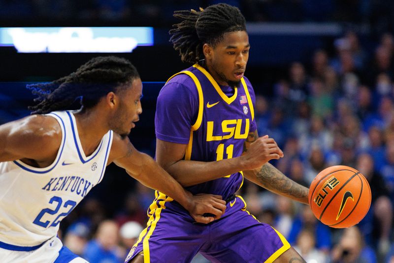 Jan 3, 2023; Lexington, Kentucky, USA; LSU Tigers guard Justice Williams (11) drives to the basket during the first half against the Kentucky Wildcats at Rupp Arena at Central Bank Center. Mandatory Credit: Jordan Prather-USA TODAY Sports