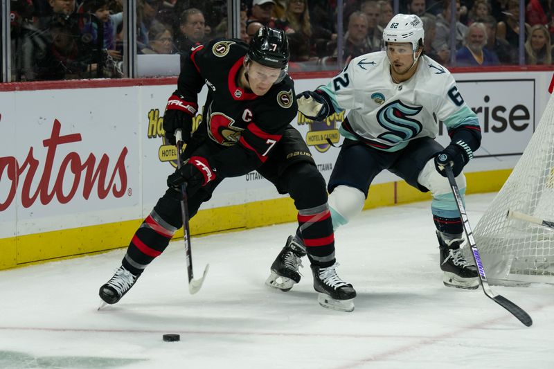 Nov 2, 2024; Ottawa, Ontario, CAN; Ottawa Senators left wing Brady Tkachuk (7) skates with the puck in front of Seattle Kraken defenseman Brandon Montour (62) in the first period at the Canadian Tire Centre. Mandatory Credit: Marc DesRosiers-Imagn Images