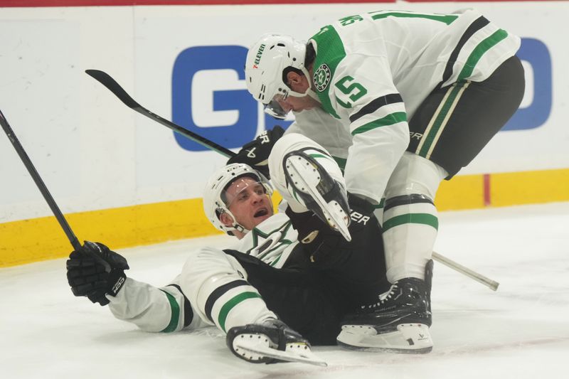 Dec 6, 2023; Sunrise, Florida, USA; Dallas Stars center Craig Smith (15) congratulates center Radek Faksa (12) after he scored a goal against the Florida Panthers during the first period at Amerant Bank Arena. Mandatory Credit: Jim Rassol-USA TODAY Sports