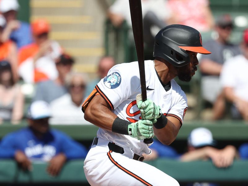 Feb 27, 2025; Sarasota, Florida, USA;  Baltimore Orioles outfielder Cedric Mullins (31) hit an RBI single during the second inning against the Toronto Blue Jays at Ed Smith Stadium. Mandatory Credit: Kim Klement Neitzel-Imagn Images