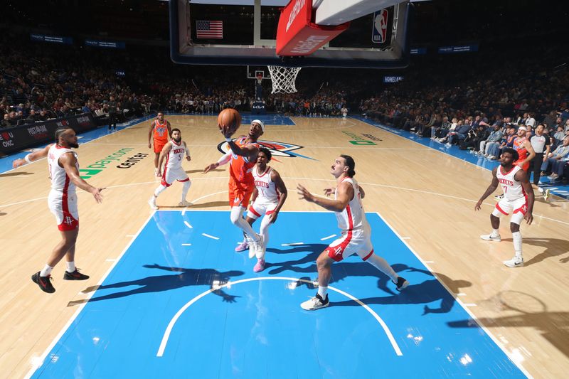 OKLAHOMA CITY, OK - NOVEMBER 8: Shai Gilgeous-Alexander #2 of the Oklahoma City Thunder drives to the basket during the game against the Houston Rockets on November 8, 2024 at Paycom Center in Oklahoma City, Oklahoma. NOTE TO USER: User expressly acknowledges and agrees that, by downloading and or using this photograph, User is consenting to the terms and conditions of the Getty Images License Agreement. Mandatory Copyright Notice: Copyright 2024 NBAE (Photo by Zach Beeker/NBAE via Getty Images)