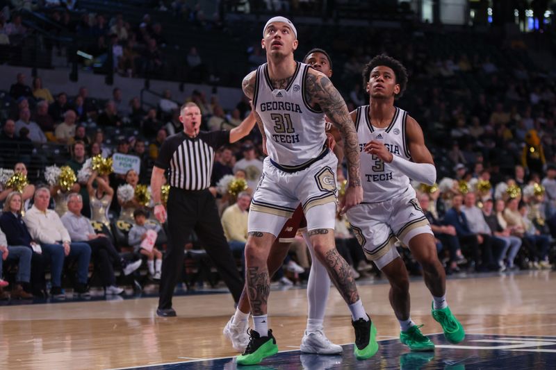 Jan 4, 2025; Atlanta, Georgia, USA; Georgia Tech Yellow Jackets forward Duncan Powell (31) boxes out against the Boston College Eagles in the first half at McCamish Pavilion. Mandatory Credit: Brett Davis-Imagn Images