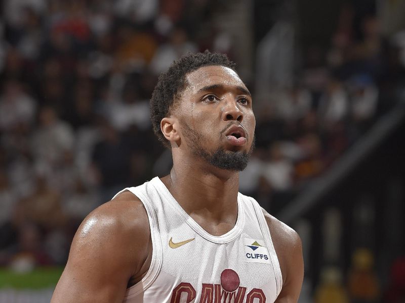 CLEVELAND, OH - APRIL 20: Donovan Mitchell #45 of the Cleveland Cavaliers prepares to shoot a free throw during Round 1 Game 1 of the 2024 NBA Playoffs against the Orlando Magic on April 20, 2024 at Rocket Mortgage FieldHouse in Cleveland, Ohio. NOTE TO USER: User expressly acknowledges and agrees that, by downloading and/or using this Photograph, user is consenting to the terms and conditions of the Getty Images License Agreement. Mandatory Copyright Notice: Copyright 2024 NBAE (Photo by David Liam Kyle/NBAE via Getty Images)