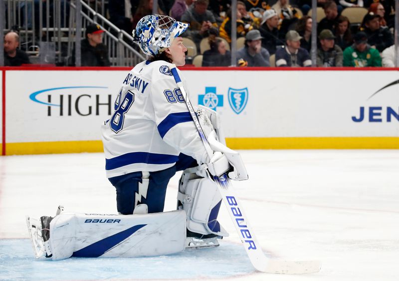 Apr 6, 2024; Pittsburgh, Pennsylvania, USA;  Tampa Bay Lightning goaltender Andrei Vasilevskiy (88) looks on against the Pittsburgh Penguins during the third period at PPG Paints Arena. The Penguins won 5-4. Mandatory Credit: Charles LeClaire-USA TODAY Sports