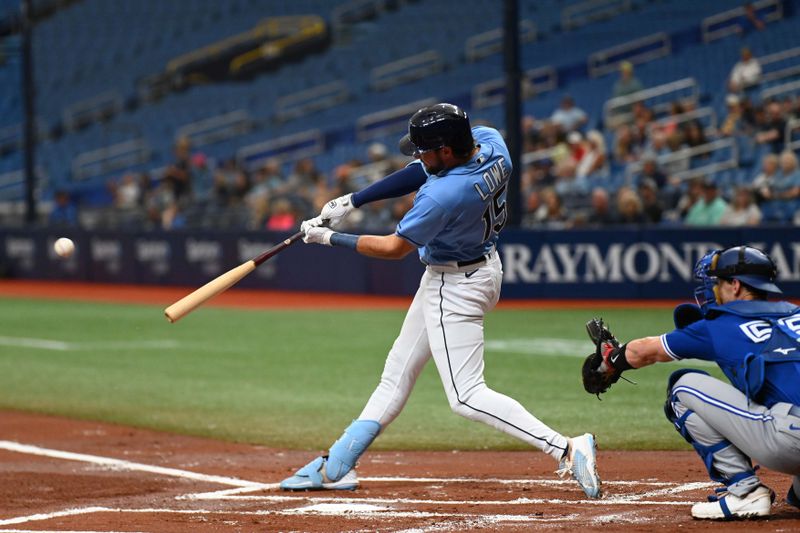 Mar 9, 2023; St. Petersburg, Florida, USA; Tampa Bay Rays left fielder Josh Lowe (15) hits a solo home run in the first inning of a spring training game against the Toronto Blue Jays at Tropicana Field. Mandatory Credit: Jonathan Dyer-USA TODAY Sports