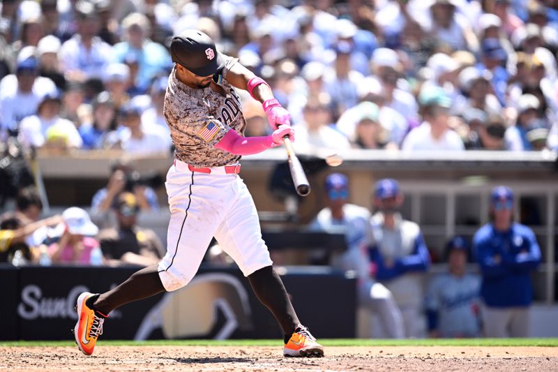 May 12, 2024; San Diego, California, USA; San Diego Padres second baseman Xander Bogaerts (2) hits a home run against the Los Angeles Dodgers during the fifth inning at Petco Park. Mandatory Credit: Orlando Ramirez-USA TODAY Sports