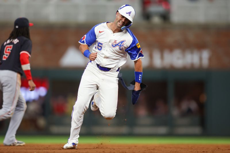 Aug 24, 2024; Atlanta, Georgia, USA; Atlanta Braves second baseman Whit Merrifield (15) runs to third against the Washington Nationals in the sixth inning at Truist Park. Mandatory Credit: Brett Davis-USA TODAY Sports
