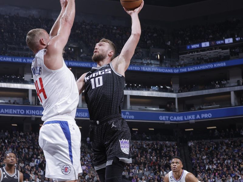 SACRAMENTO, CA - MARCH 3: Domantas Sabonis #10 of the Sacramento Kings drives to the basket during the game against the LA Clippers on March 3, 2023 at Golden 1 Center in Sacramento, California. NOTE TO USER: User expressly acknowledges and agrees that, by downloading and or using this Photograph, user is consenting to the terms and conditions of the Getty Images License Agreement. Mandatory Copyright Notice: Copyright 2023 NBAE (Photo by Rocky Widner/NBAE via Getty Images)