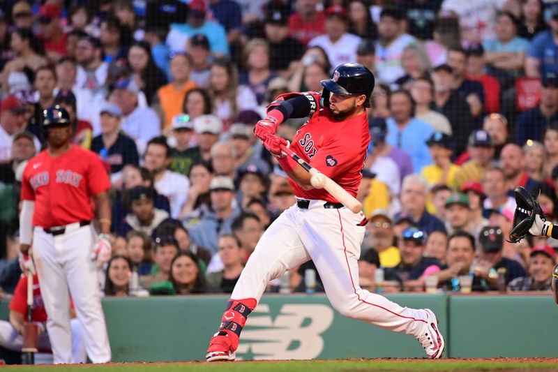 Jun 28, 2024; Boston, Massachusetts, USA; Boston Red Sox right fielder Wilyer Abreu (52) hits a single against the San Diego Padres during the fourth inning at Fenway Park. Mandatory Credit: Eric Canha-USA TODAY Sports