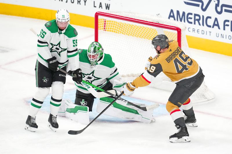 Jan 29, 2026; Las Vegas, Nevada, USA; Dallas Stars defenseman Thomas Harley (55) blocks a shot in front of  goaltender Jake Oettinger (29) as Vegas Golden Knights left wing Ivan Barbashev (49) attempts a deflection during the third period at T-Mobile Arena. Mandatory Credit: Stephen R. Sylvanie-Imagn Images