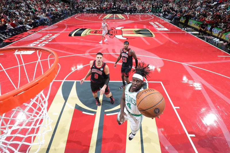 CHICAGO, IL - NOVEMBER 29: Jrue Holiday #4 of the Boston Celtics drives to the basket during the game against the Chicago Bulls during the Emirates NBA Cup game on November 29, 2024 at United Center in Chicago, Illinois. NOTE TO USER: User expressly acknowledges and agrees that, by downloading and or using this photograph, User is consenting to the terms and conditions of the Getty Images License Agreement. Mandatory Copyright Notice: Copyright 2024 NBAE (Photo by Jeff Haynes/NBAE via Getty Images)