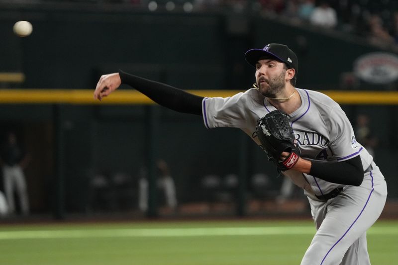 Aug 14, 2024; Phoenix, Arizona, USA; Colorado Rockies pitcher Riley Pint (41) throws against the Arizona Diamondbacks in the sixth inning at Chase Field. Mandatory Credit: Rick Scuteri-USA TODAY Sports