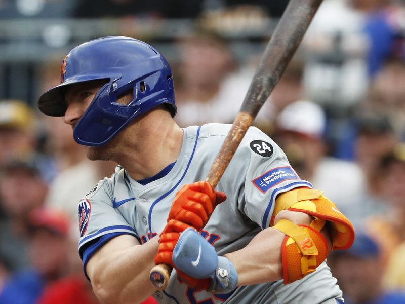 Jul 5, 2024; Pittsburgh, Pennsylvania, USA; New York Mets first baseman Pete Alonso (20) hits a single against the Pittsburgh Pirates during the second inning at PNC Park. Mandatory Credit: Charles LeClaire-USA TODAY Sports