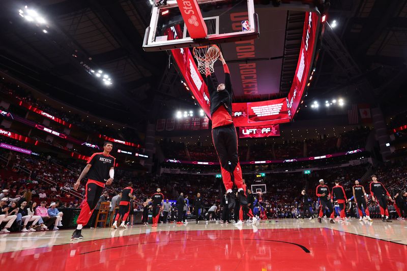 HOUSTON, TEXAS - JANUARY 01: Jock Landale #2 of the Houston Rockets warms up before a game against the Dallas Mavericks at Toyota Center on January 01, 2025 in Houston, Texas. NOTE TO USER: User expressly acknowledges and agrees that, by downloading and or using this photograph, User is consenting to the terms and conditions of the Getty Images License Agreement. (Photo by Alex Slitz/Getty Images)