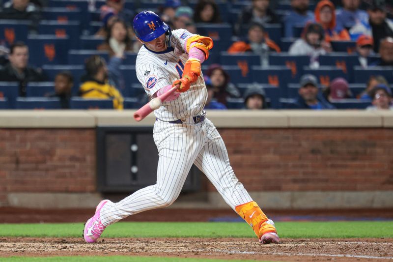 May 12, 2024; New York City, New York, USA; New York Mets first baseman Pete Alonso (20) hits an RBI double during the sixth inning against the Atlanta Braves at Citi Field. Mandatory Credit: Vincent Carchietta-USA TODAY Sports