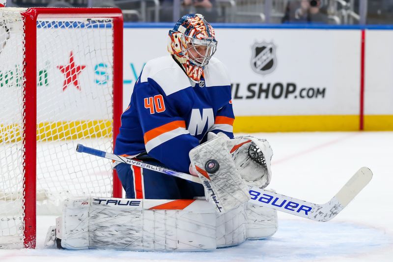 Apr 6, 2024; Elmont, New York, USA; New York Islanders goaltender Semyon Varlamov (40) makes a save against the Nashville Predators during the first period at UBS Arena. Mandatory Credit: Tom Horak-USA TODAY Sports