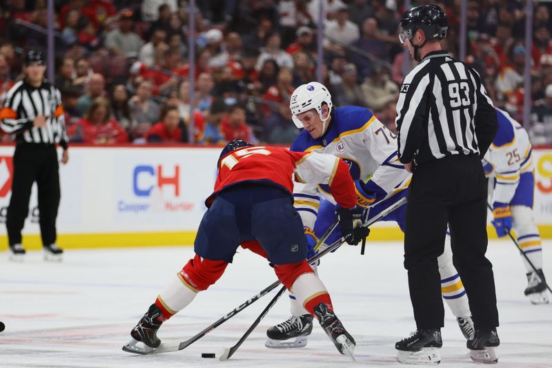 Apr 13, 2024; Sunrise, Florida, USA; Florida Panthers center Anton Lundell (15) and Buffalo Sabres center Tage Thompson (72) face-off during the first period at Amerant Bank Arena. Mandatory Credit: Sam Navarro-USA TODAY Sports