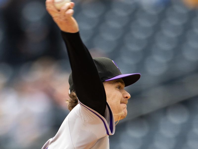 May 5, 2024; Pittsburgh, Pennsylvania, USA; Colorado Rockies starting pitcher Ryan Feltner (18) pitches against the Pittsburgh Pirates during the first inning at PNC Park. Mandatory Credit: Scott Galvin-USA TODAY Sports