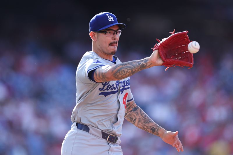 Jul 11, 2024; Philadelphia, Pennsylvania, USA; Los Angeles Dodgers pitcher Anthony Banda (43) fields a ball for an out Philadelphia Phillies during the first inning at Citizens Bank Park. Mandatory Credit: Bill Streicher-USA TODAY Sports