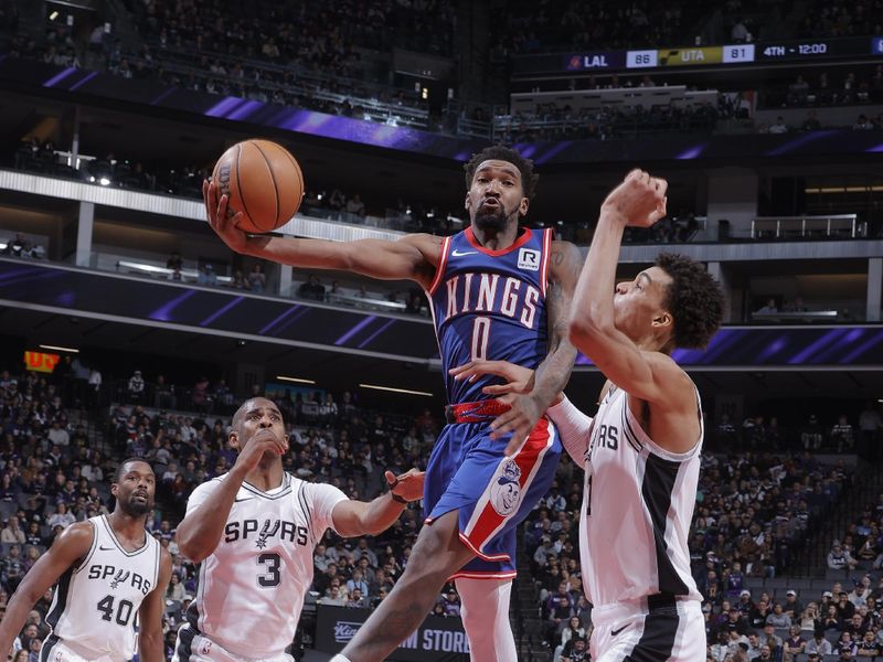 SACRAMENTO, CA - DECEMBER 1: Malik Monk #0 of the Sacramento Kings passes the ball during the game against the San Antonio Spurs on December 1, 2024 at Golden 1 Center in Sacramento, California. NOTE TO USER: User expressly acknowledges and agrees that, by downloading and or using this Photograph, user is consenting to the terms and conditions of the Getty Images License Agreement. Mandatory Copyright Notice: Copyright 2024 NBAE (Photo by Rocky Widner/NBAE via Getty Images)