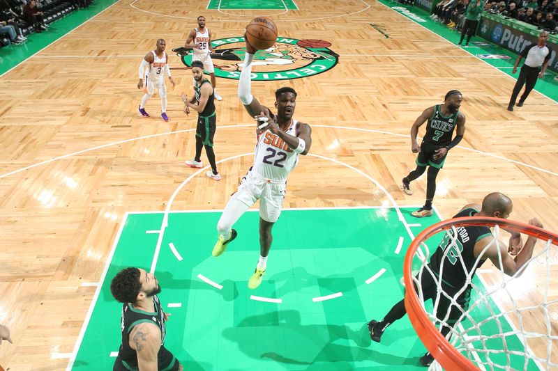 BOSTON, MA - FEBRUARY 3: Deandre Ayton #22 of the Phoenix Suns rebounds the ball during the game against the Boston Celtics on February 3, 2023 at TD Garden in Boston, Massachusetts.  NOTE TO USER: User expressly acknowledges and agrees that, by downloading and or using this photograph, User is consenting to the terms and conditions of the Getty Images License Agreement. Mandatory Copyright Notice: Copyright 2022 NBAE  (Photo by Nathaniel S. Butler/NBAE via Getty Images)