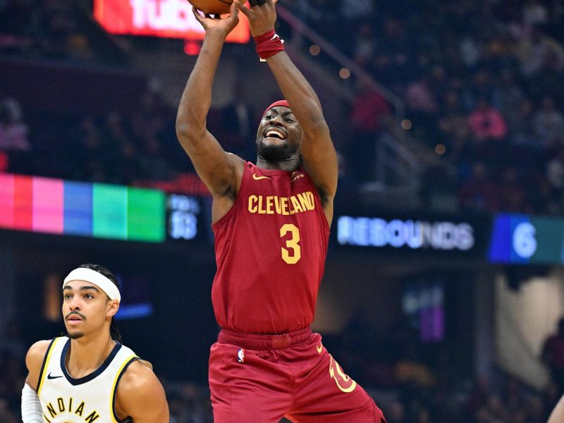 CLEVELAND, OHIO - OCTOBER 28: Caris LeVert #3 of the Cleveland Cavaliers shoots over Andrew Nembhard #2 of the Indiana Pacers during the first quarter at Rocket Mortgage Fieldhouse on October 28, 2023 in Cleveland, Ohio. NOTE TO USER: User expressly acknowledges and agrees that, by downloading and or using this photograph, User is consenting to the terms and conditions of the Getty Images License Agreement. (Photo by Jason Miller/Getty Images)