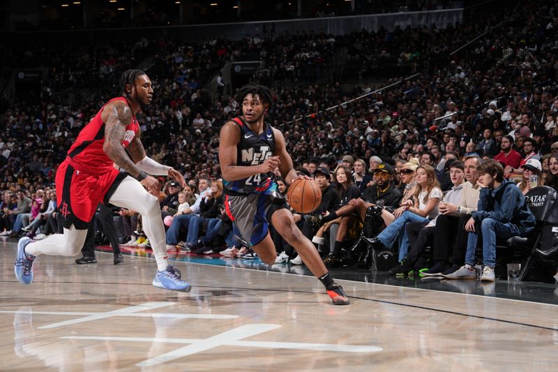 BROOKLYN, NY - JANUARY 27: Cam Thomas #24 of the Brooklyn Nets drives to the basket during the game against the Houston Rockets on January 27, 2024 at Barclays Center in Brooklyn, New York. NOTE TO USER: User expressly acknowledges and agrees that, by downloading and or using this Photograph, user is consenting to the terms and conditions of the Getty Images License Agreement. Mandatory Copyright Notice: Copyright 2024 NBAE (Photo by Jesse D. Garrabrant/NBAE via Getty Images)