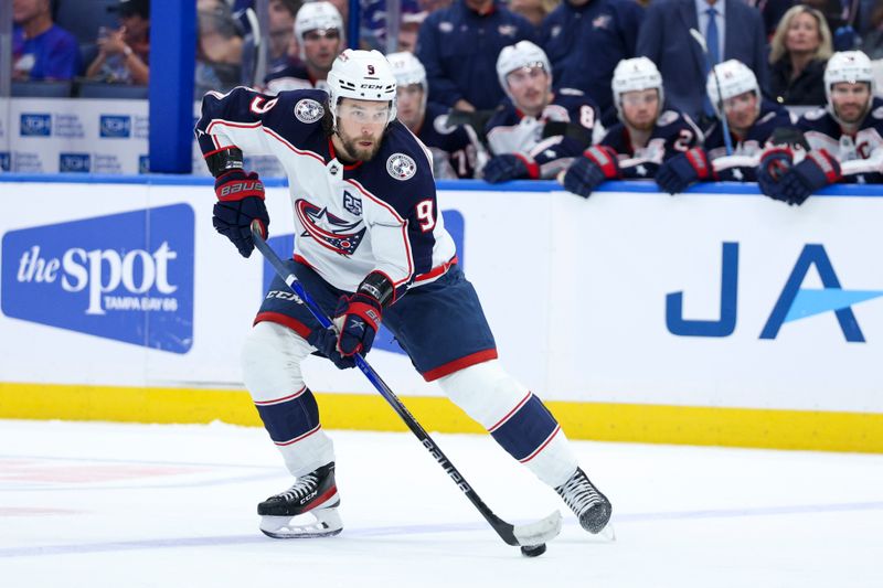 Mar 10, 2026; Tampa, Florida, USA; Columbus Blue Jackets defenseman Ivan Provorov (9) controls the puck against the Tampa Bay Lightning in the second period at Benchmark International Arena. Mandatory Credit: Nathan Ray Seebeck-Imagn Images