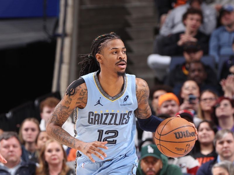 MEMPHIS, TN - MARCH 10: Ja Morant #12 of the Memphis Grizzlies handles the ball during the game against the Phoenix Suns on March 10, 2025 at FedExForum in Memphis, Tennessee. NOTE TO USER: User expressly acknowledges and agrees that, by downloading and or using this photograph, User is consenting to the terms and conditions of the Getty Images License Agreement. Mandatory Copyright Notice: Copyright 2025 NBAE (Photo by Joe Murphy/NBAE via Getty Images)